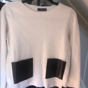 Sweater with faux leather front pockets